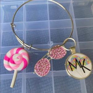 Silver plated bangle with charms